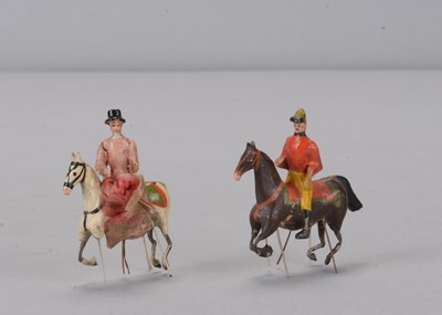 Lot 147 - Two unusual mid 19th century German bristle toys of a mounted huntsman and woman