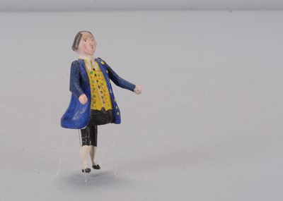 Lot 150 - A late 19th century German bristle dancing 18th century gentleman toy