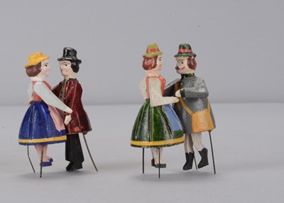 Lot 151 - Two larger late 19th century German bristle dancing couples toys