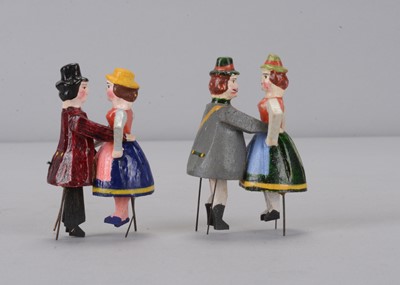 Lot 151 - Two larger late 19th century German bristle dancing couples toys