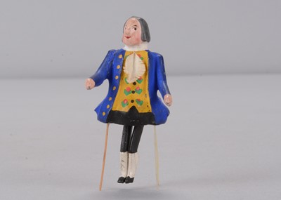 Lot 160 - A late 19th century German bristle dancing 18th century gentleman toy