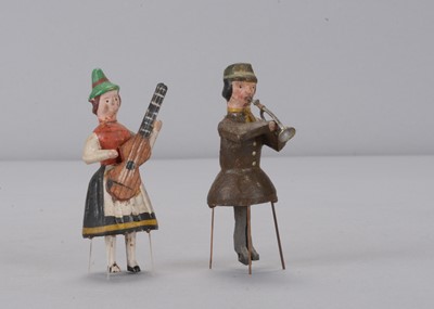 Lot 165 - Two larger late 19th century German bristle dancing toys playing instruments