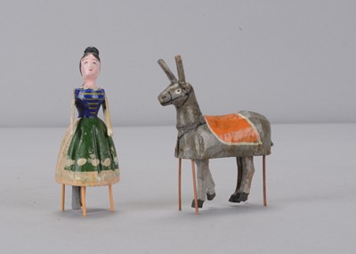 Lot 168 - A late 19th century German dancing donkey and girl bristle toys