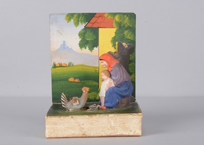 Lot 176 - A mid to late 19th century Thüringen composition woman with child and chicken squeak toy