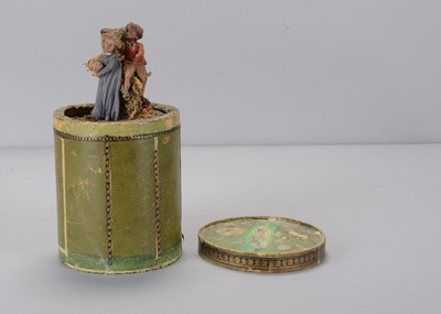 Lot 182 - A mid 19th century German carved wooden pastoral scene of a courting couple jack in the box