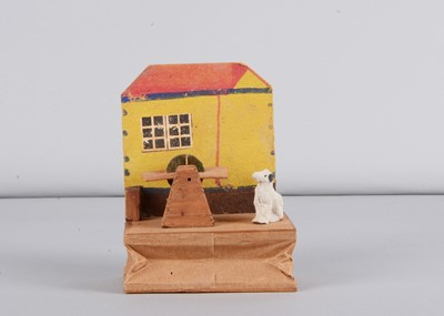 Lot 192 - A late 19th century German simplistic watermill squeak toy