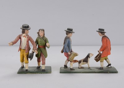 Lot 193 - Two groups of mid 19th century German carved wooden countrymen, probably Erzgebirge