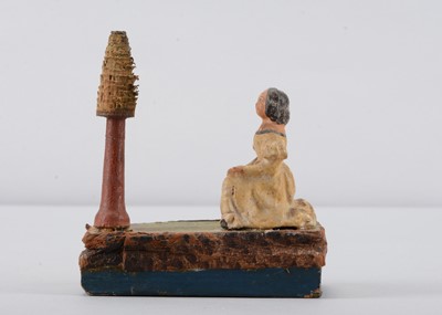 Lot 198 - A mid 19th century Thüringen girl and tree squeak toy