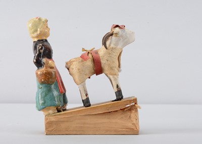 Lot 200 - A late 19th or early 20th century shepherdess squeak toy, possibly French