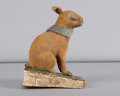 Lot 204 - A mid 19th century Thüringen seated rabbit squeak toy