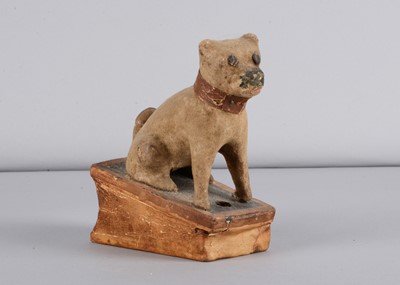 Lot 205 - A mid 19th century Thüringen seated pug dog squeak toy