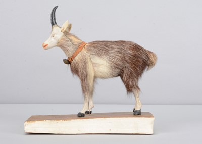 Lot 216 - A mid 19th century composition and skin goat squeak toy