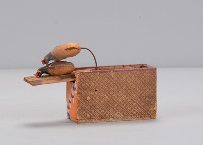 Lot 222 - A mid 19th century Erzgebirge chicken toy