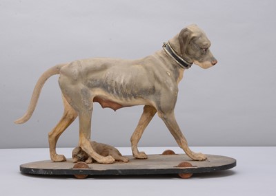 Lot 223 - A large mid to late 19th century Thüringen pull-along hunting hound bitch with puppy