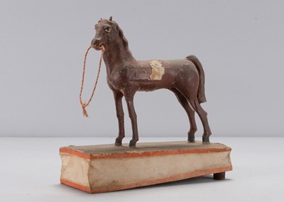 Lot 224 - A mid 19th century Thüringen horse squeak toy