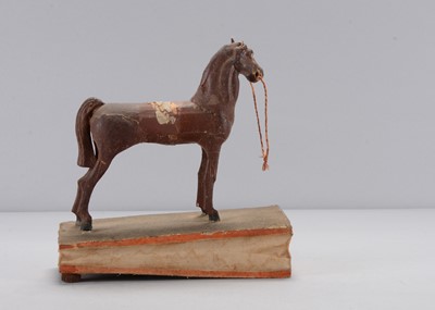 Lot 224 - A mid 19th century Thüringen horse squeak toy