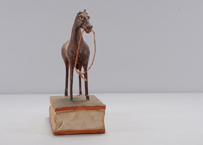 Lot 224 - A mid 19th century Thüringen horse squeak toy