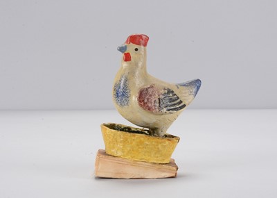 Lot 227 - An early 20th century chicken squeak toy