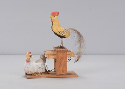 Lot 229 - A late 19th century German chicken squeak toy