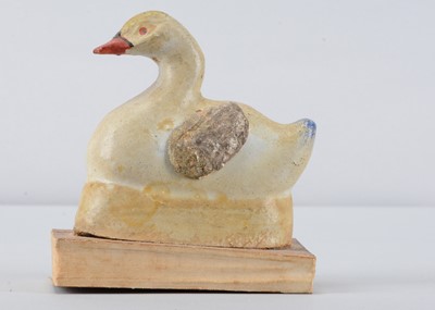 Lot 233 - A late 19th century Thüringen goose squeak toy with flapping wings