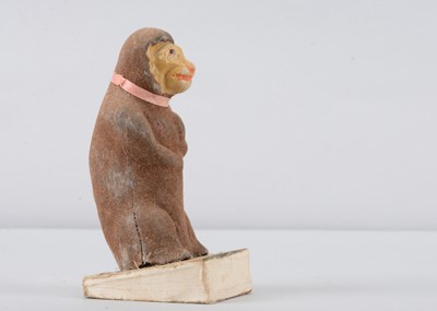 Lot 235 - A late 19th century Thüringen monkey squeak toy