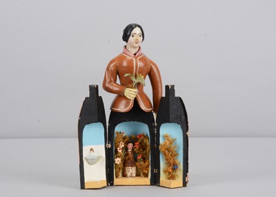 Lot 241 - An early to mid 19th century Oberammergau wooden figure of a woman with suitor hidden in her skirt