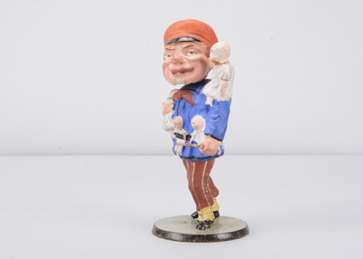 Lot 243 - A mid to late 19th century baby deliverer (Kinderbringer) or doll seller nodder