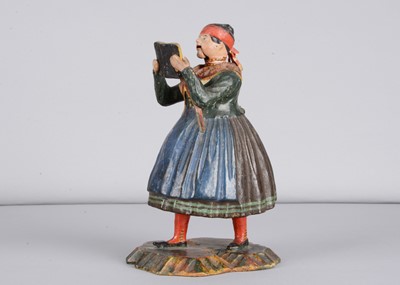 Lot 248 - A mid 19th century Rhöner papier-mâché Rhönwackler (nodder) woman reading