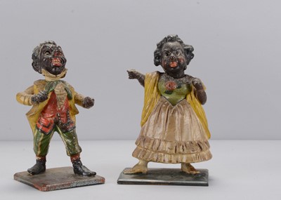 Lot 251 - A pair of 19th century Thüringen papier-mâché black nodders