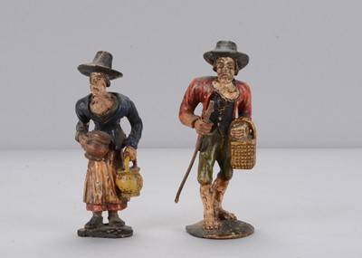 Lot 255 - An 19th century European carved wooden couple with Goitre growths