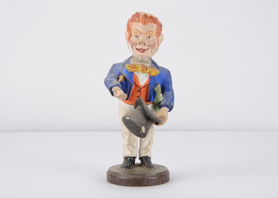 Lot 257 - A late 19th century Thüringen composition nodder of a red headed gentleman