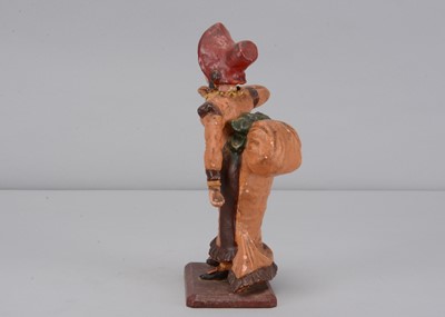Lot 259 - A mid 19th century Thüringen papier-mâché woman singing figure adopting The Grecian Bend