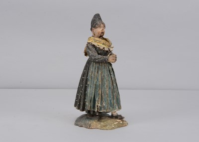 Lot 260 - A mid 19th century Rhöner papier-mâché and wood Rhönwackler (nodder) woman