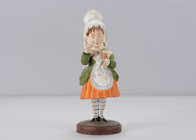 Lot 276 - A mid 19th century Thüringen swaying young girl in tall lace cap