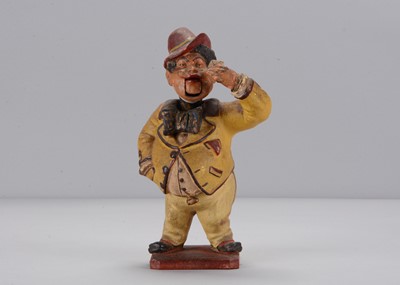 Lot 292 - A mid to late 19th century Thüringen comic man holding an envelope nodder