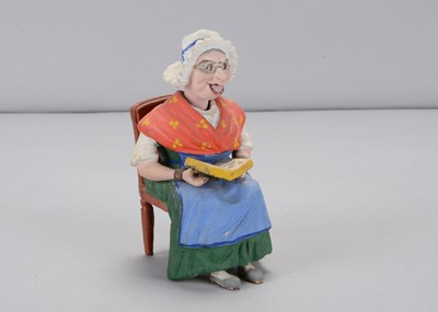 Lot 304 - A late 19th century  Thüringen old lady reading nodder