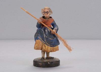 Lot 307 - A mid 19th century Thüringen old woman sweeping swaying