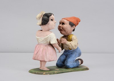 Lot 317 - A late 19th century  Thüringen courting couple nodders