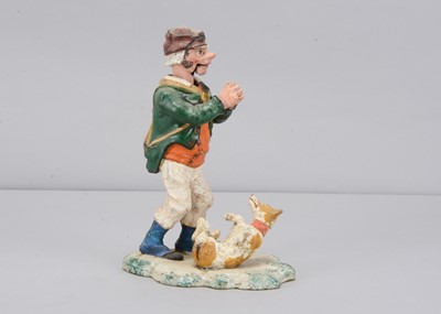 Lot 318 - A mid to late 19th century Thüringen man with dog nodder