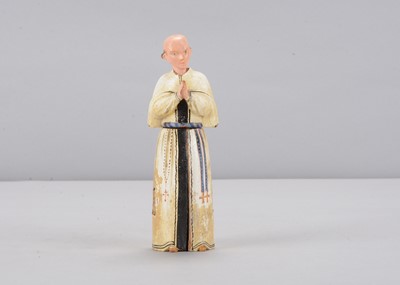 Lot 328 - An early to mid 19th century Oberammergau wooden figure of a monk with hidden chapel in white robes