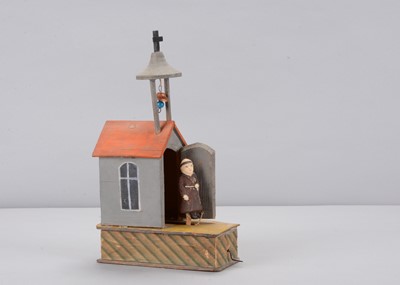 Lot 330 - A late 19th century Erzgebirge monk and chapel crank toy