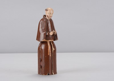 Lot 334 - An early to mid 19th century Oberammergau wooden figure of a monk with hidden chapel in robes