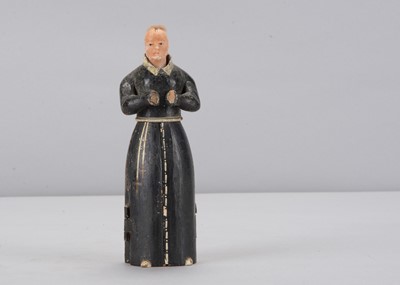 Lot 336 - An early to mid 19th century Oberammergau wooden figure of a nun with hidden chapel in robes