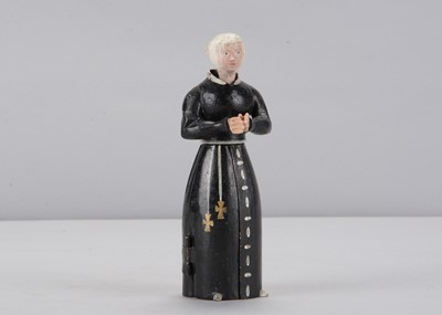 Lot 338 - A mid 19th century Oberammergau wooden figure of a nun with hidden chapel in robes