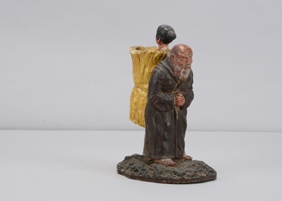 Lot 339 - An 1840s Thüringen papier-mâché monk fetching provisions