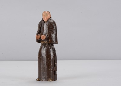 Lot 341 - An early to mid 19th century Oberammergau wooden figure of a monk with hidden chapel in robes