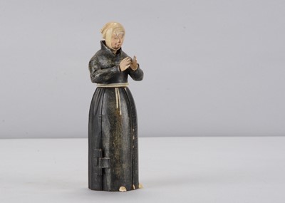 Lot 342 - An early to mid 19th century Oberammergau wooden figure of a nun with hidden chapel in robes