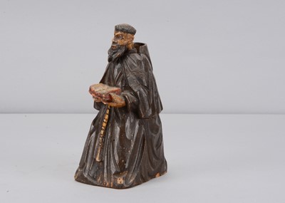 Lot 346 - A mid 19th century carved wooden praying monk nodder