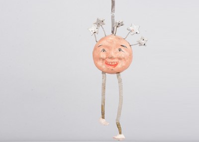 Lot 350 - A late 19th century German man in the moon hanging toy, possibly a Christmas decoration