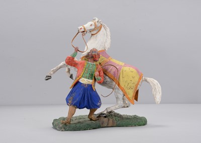 Lot 356 - An exhibition quality mid 19th century Thüringen composition  Turk with rearing horse